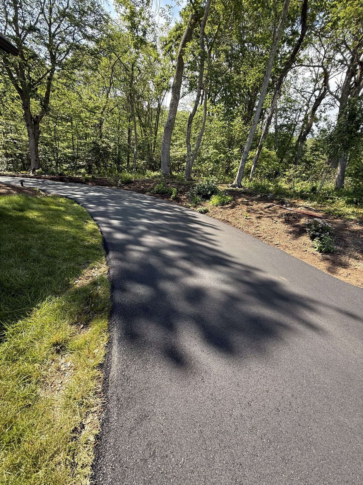 Paved by Slick's Paving